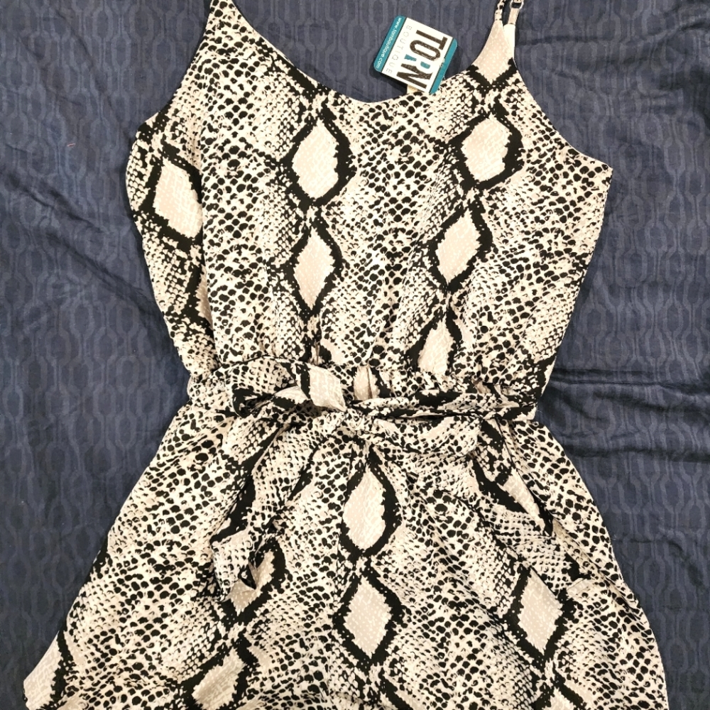 Snakeskin Romper w/tags, size large.
